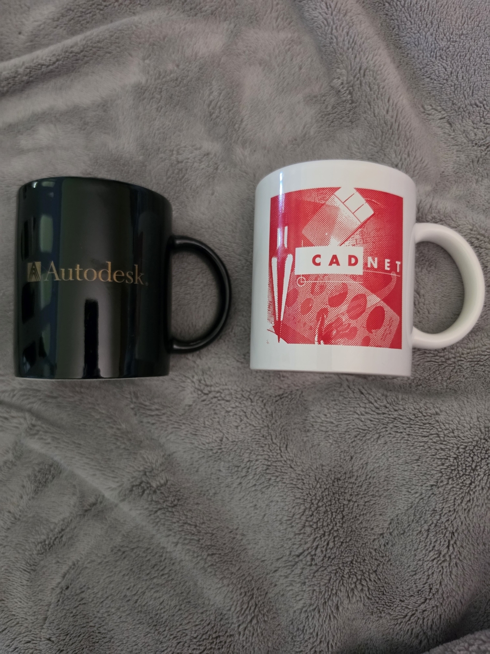 Black Autodesk Coffee Mug and White Cadnet Coffee Mug